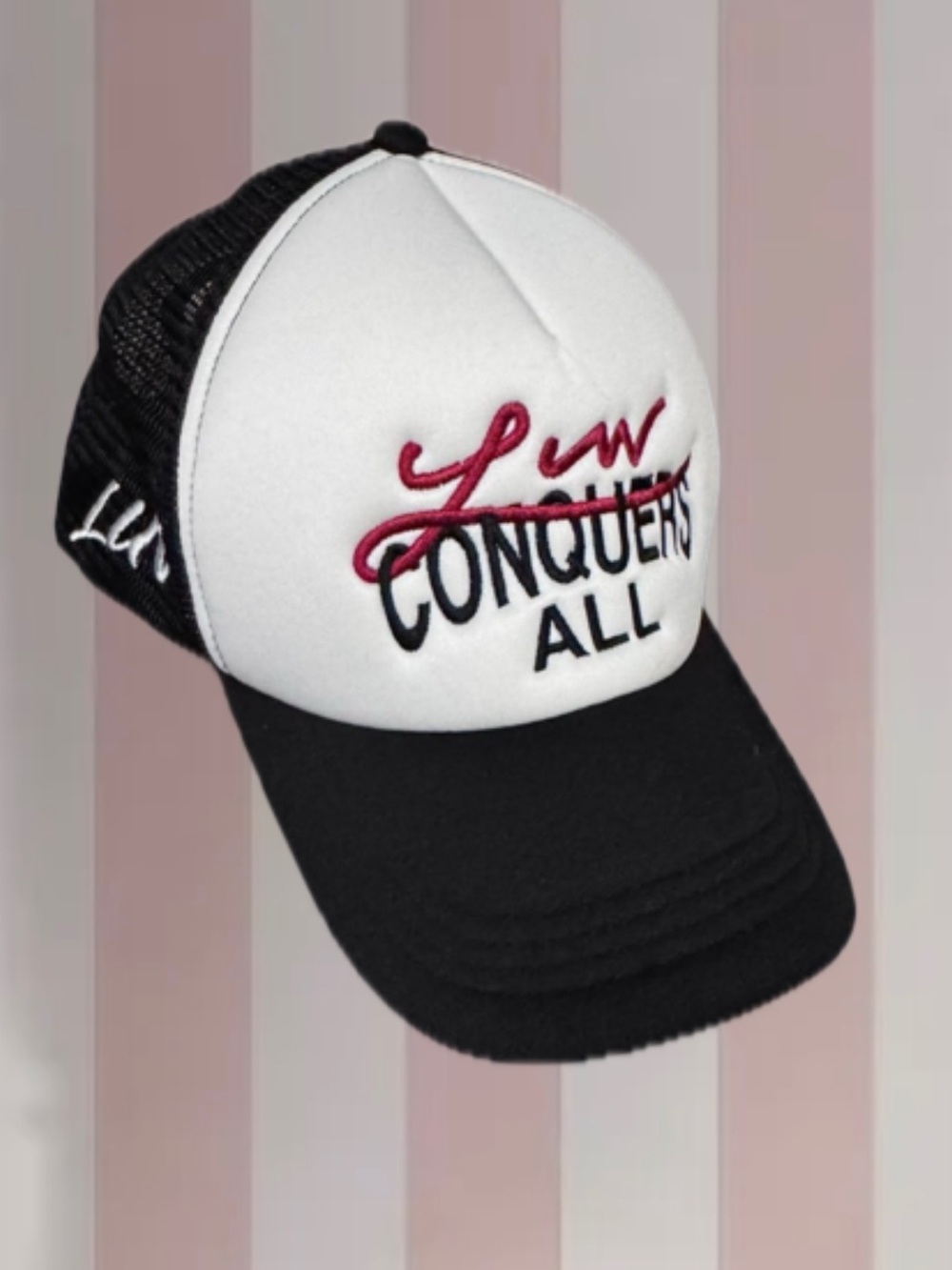 Luv Conquers All Trucker Hat